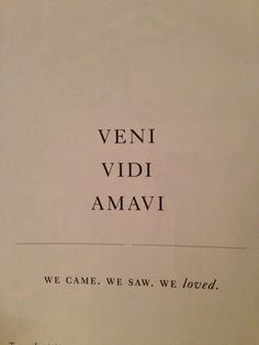 an old book with the words veni vidi amavi written in black on it