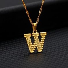 This uppercase initial necklace is perfect for a meaningful gift to someone special or for yourself, a dainty letter surely to be a beautiful accent piece to any occasion! Product Description♥ Material: Stainless Steel/ Gold plated♥ Chain Type: Water-wave Chain♥ Pendant Size: 14 cm (0.55'') Shipping Time♥ USA > 4-10 business days♥ International > 2-3 weeks قلادات متدلية, Valentine Gifts Jewelry, Initial Letter Necklace, Birthday Pendant, Alphabet Pendant, Gold Letter Necklace, Trending Necklaces, Letter W, Initial Pendant Necklace