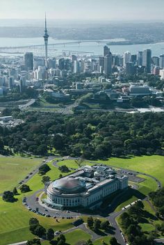 an aerial view of a large building in the middle of a city