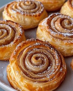 there are many different types of pastries on the plate