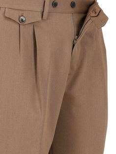 Briglia 1949 slim trousers in brown virgin wool, belt loops, zip and button closure, central pin tucks, two back flap pockets, turn-up hem. Brown Business Dress Pants With Welt Pockets, Tailored Brown Dress Pants With Welt Pockets, Classic Brown Wool Pants, Brown Business Bottoms With Belt Loops, Brown Business Pants With Belt Loops, Business Brown Bottoms With Belt Loops, Business Brown Pants With Belt Loops, Brown Wool Dress Pants With Tapered Leg, Brown Wool Tapered Leg Dress Pants