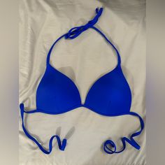 Blue Triangle Swimsuit Bikini Top Slight Push Up Padding Brand New Never Worn Size M Royal Blue Good Quality Fitted Royal Blue Swimwear For Pool, Fitted Royal Blue Swimwear For Vacation, Royal Blue Swimwear For Beach, Fitted Royal Blue Swimwear For Beach, Blue Seamless Triangle Top Swimwear, Blue Triangle Top Swimwear With Built-in Bra, Blue Ruched V-neck Swimwear, Blue Swimwear With Built-in Bra And Tie-side Bottom, Nylon Swimwear With Built-in Bra Triangle Top