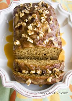 a loaf of banana nut bread on a plate