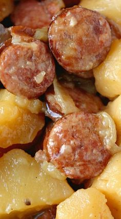 closeup of pineapple and sausage with brown sauce