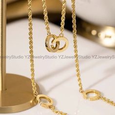 ❤️18k Solid Gold Rope Chain Necklace❤️ Season's New MUST HAVE! This super versatile and elegant rope chain necklace is finely crafted with 18k solid yellow gold.  The necklace features four 'C' pendants, which can be used as clasps for multiple ways to style your look! It is a 'MUST HAVE' divine necklace to keep in your jewelry collection.  It is perfect to wear solo and can be styled in different ways, or stacked up with your all time favourites! Unlike 18k gold vermeil or gold filled, 18k gold Luxury 14k Gold Necklace With Rope Chain, Elegant Gold-plated Rope Chain Necklace, Luxury Gold-tone Polished Chain Necklace, Formal Yellow Gold Tarnish-resistant Rope Chain Necklace, Luxury Gold-tone Rope Chain Jewelry, Double Layer Necklace, Gold Rope Chains, Stacked Necklaces, Solid Gold Jewelry