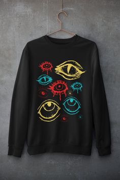 Thanks for stopping by! Clowncore eyes sweatshirt Please size up by one or two sizes for an over sized look Usually dispatched in 5 working days ECO-FRIENDLY Each garment is made to order, reducing extra material and energy that would be otherwise wasted We use DTG printing process which is easier on the environment than screen-printing Our ink is bright and also eco-friendly. Material: 80% ringspun cotton/20% polyester. - Drop shoulder style. - Stylish fit. - Soft cotton faced fabric. - Taped n Eye Fashion Clothes, Clowncore Aesthetic Outfits, Weirdcore Aesthetic Outfits, Dreamcore Fashion, Dark Clowncore, Dreamcore Outfits, Clowncore Clothes, Weirdcore Fashion, Weirdcore Clothes