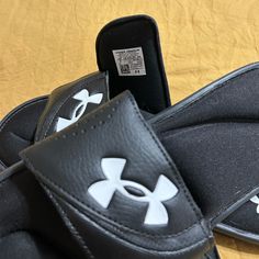 Questions? Leave A Comment Below! Black Slides With Branded Insole For Outdoor, Casual Black Leather Slides, Under Armour Black Casual Sneakers, Black Casual Under Armour Sneakers, Casual Black Under Armour Sneakers, Black Leather Slides For Outdoor, Outdoor Black Leather Slides, Under Armour Shoes, Flip Flop Sandals