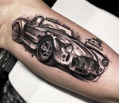 a black and white drawing of a car on the right upper half of the arm