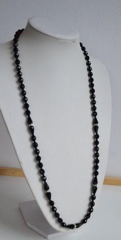 ART DECO vintage French black jet glass station beaded flapper necklace with faceted beads and rhinestone rondelle - opera length - with clasp.   31 inches; round faceted beads: 8 mm. Good vintage condition -sold as is. RETURN NOT ACCEPTED. PLEASE ASK BEFORE PURCHASE. Thank you for watching our other items! Many other rare items are to come! Combined shipping available where possible -please contact us for details before buying the items. Flapper Necklace, Rare Items, Black Jet, Deco Vintage, Glass Bead Necklace, Faceted Bead, Vintage French, French Vintage, Etsy Vintage