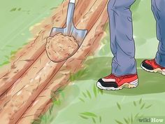 a person digging dirt in the ground with a shovel