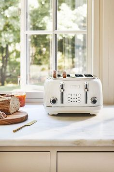 a toaster sitting on top of a kitchen counter