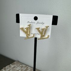 New! Brand New And Never Worn. Gold Tone Lv Earrings, With A Post Back. Sold As Seen. Lv Earrings, Earrings Color, Everyday Look, Gold Tones, Fashion Jewelry, Jewelry Earrings, Women Jewelry, Brand New, Gold