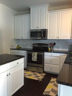 the kitchen is clean and ready for us to use it's new stainless steel appliances