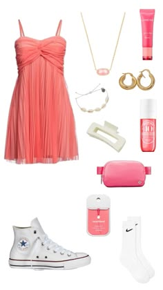 a pink dress and accessories are arranged on a white background