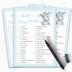 two baby shower games with an elephant on the front and one in the back, next to a pen