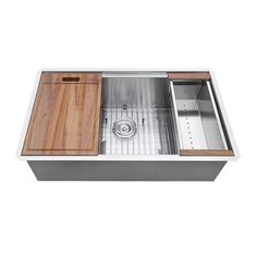 a stainless steel kitchen sink with wooden cabinet doors and bottom grid, undermounted