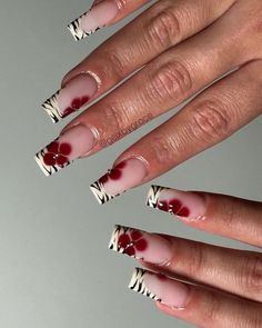 These nails feature a chic zebra pattern on the tips with vibrant red flowers, evoking a tropical summer vibe.  🌸Click on the image to shop our trending Korean Gel Polish this season.  🌸Credit: gelxbygrace on Instagram 🌸summer nails, zebra nails, red flower nails, tropical nails, Korean gel polish, floral nail design, summer nail trends, gel nails, trending nail designs, manicure inspiration, nail art, summer manicure, nail fashion, stylish nails, nail aesthetics, nail beauty, summer nail colors, nail designs 2024, chic nails, nail trends. Long Nail Designs Easy, Nails Trends 2024 Summer, Korean Gel Manicure, Nail Tree Design, Red And Zebra Nails, White French Tip With Accent Nail, Long Coffin Nail Designs Ideas, Nail Ideas Abstract, Nail Designs No Charms