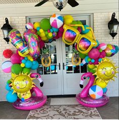 an entrance decorated with balloons and decorations