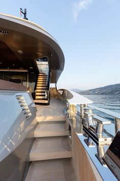 stairs leading up to the upper deck of a boat