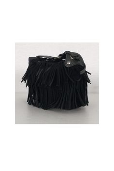 One-of-a-kind miniature purse from Hogan. Made with an all fringe trim and an adjustable strap for comfort. This chic bag is a unique treasure! Suede Flat top leather strap Snap button closure on strap - adjustable length Silver-tone hardware Open top Fringe trim Light wear on suede Width 6.5" Height 5" Depth 1.5" Handle drop 8"- longest Miniature Purse, Suede Purse, Fringe Purse, Suede Flats, Chic Bags, Suede Fringe, Fringe Trim, Flats Top, Open Top