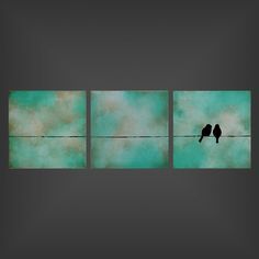 two birds sitting on a wire in front of green and blue background with clouds behind them