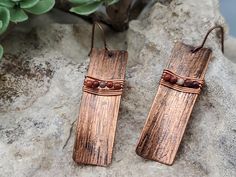 Copper dangles are hand-textured, lightly oxidized, and a slight synclastic curve added. Tiny, round red jasper beads and fine copper wire add accent while hypoallergenic ear wires complete the rustic look. Drop dimensions: Length (from ear wire): 1.5 Inch Width: 0.5 inch Ready to ship. Metal Earrings Handmade, Bar Jewelry, Sell Gold, Argentium Silver, Upcycled Jewelry, Jasper Beads, Handmade Copper, Red Jasper, Metal Earrings