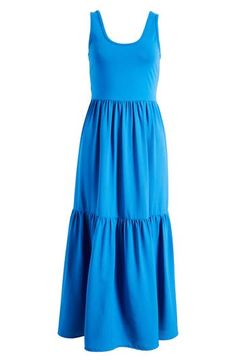 Dance the night away in this easygoing maxi dress that has a pretty tiered skirt and a solid color that makes for easy accessorizing. 51 1/2" length (size Medium) Scoop neck Sleeveless 93% cotton, 7% spandex Machine wash, dry flat Imported Solid Tiered Midi Dress For Beach, Blue Tiered Maxi Dress For Vacation, Solid Tiered Maxi Dress With Ruffle Hem, Solid Color Tiered Maxi Dress For Vacation, Tiered Maxi Dress For Vacation, Casual Blue Midi Tiered Dress, Casual Blue Midi Length Tiered Dress, Casual Blue Maxi Length Tiered Dress, Blue Casual Midi Dress With Tiered Skirt