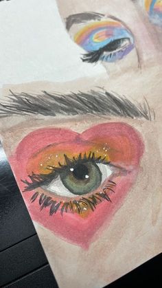 a drawing of a woman's eye with colorful makeup