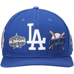 Add the next go-to Los Angeles Dodgers piece to your rotation with this All-Star Multi Hit Wool snapback hat from Pro Standard. Embroidered team graphics and a contrast-color undervisor combine for an exciting way to make your fandom loud and clear. The high crown and flat bill provide a classic baseball cap feel that you'll want to reach for anytime you're ready to cheer on the Los Angeles Dodgers. Snapback Brand: Pro Standard Officially licensed Contrast-color undervisor High Crown One size fi Snapback Hat For Baseball Season Sports Events, Baseball Season Snapback Hat With Logo Patch, Logo Patch Snapback Hat For Baseball Season, Throwback Adjustable Snapback Hat For Baseball Season, Curved Bill Snapback Hat For Baseball Season, Baseball Season Snapback Hat With Curved Bill, Throwback Snapback Trucker Hat For Baseball Season, Six-panel Snapback Hat For Baseball Season, Throwback Baseball Trucker Hat