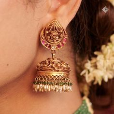 Every bride deserves a pair of jhumkas that steal the show. Let your ears do the talking with these exquisite pieces. Featured here are our jhumkas that catch the light with every turn, crafted with 22K gold and adorned with rubies, valanda, and pearls. WhatsApp 9964641869 for enquiries. 📍Visit the Blue CKC&Co. Flagship store , near Safina Plaza. Look for the DIAMOND logo! Featuring: @lepana_nagaraj Hair and Makeup: @makeupbyshwethamahadev #CKCCo #JewelleryLovers #InstaJewellery #Jewelle... Hair Colour Design, Indian Bridal Jewellery, Diamond Logo, Fancy Blouse, Colour Design, Jewelry Design Earrings, Gold Earrings Designs, Design Earrings