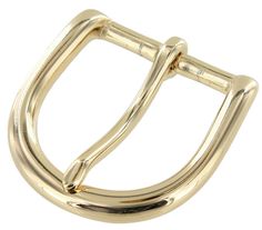 a gold metal buckle on a white background