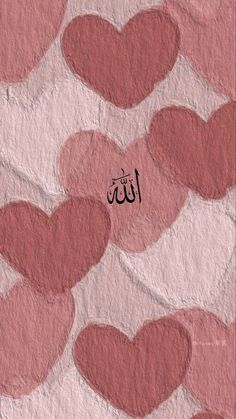 hearts are arranged in the shape of an arabic calligraphy on pink and white paper