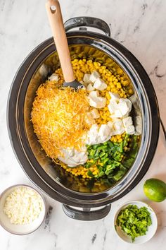 the ingredients for this mexican salad are mixed in an instant pressure cooker and ready to be cooked