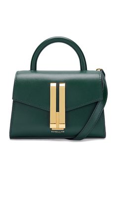 Find DEMELLIER Nano Montreal Bag In Dark Green on Editorialist. DeMellier London Nano Montreal Bag in Dark Green. DeMellier London Nano Montreal Bag in Dark Green. Leather exterior with textile lining. Imported. Flap top with gold-tone push lock closure. One main compartment. Integrated structured leather handle. Detachable and adjustable leather shoulder strap. Measures approx 7.1 W x 4.7 H x 3.5 D Shoulder strap with a 19 drop Top handle with a 2 drop. DEMR-WY122. N44. DeMellier was founded with the vision of doing things differently: to design handbags that would make women feel empowered, and made ethically and sustainably while giving back to those who needed most. All of the pieces are crafted ethically in Spain or Italy using the finest sustainably sourced materials. For every piece Adjustable Bag, Shoulder Strap Bag, Children In Need, Small Handbags, Green Bag, Green Leather, Leather Top, Leather Handle, Forest Green