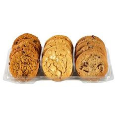 three cookies in a plastic container on a white background with clippings to the side