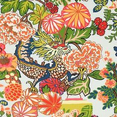 an image of colorful flowers and birds on a blue background with green leaves in the middle