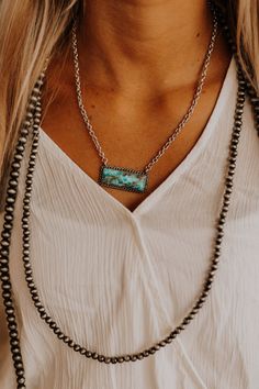 Our new Turquoise Bar Necklace is simple but elegant. Add the perfect splash of color to your jewelry collection! Try it out with your favorite western inspired outfit to tie your look together. Paired with our layered pearl necklace. Western Inspired Outfits, Pearl Layered Necklace, Turquoise Bar Necklace, Turquoise Bar, Layered Pearl Necklace, Necklace Outfit, Western Necklaces, Layered Necklaces Silver, Silver Pearl Necklace