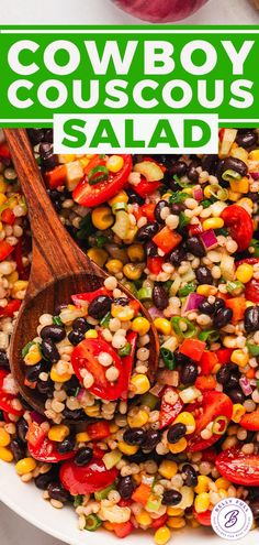 a bowl filled with black beans, corn and tomatoes next to a wooden spoon on top of the bowl