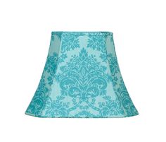 a blue lamp shade with an ornate design on it