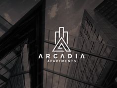 the logo for arcadia apartments is shown in front of tall buildings with windows and cloudy sky