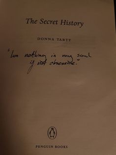 the secret history by donna tart signed on top of a piece of parchment paper