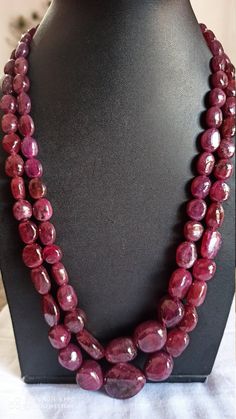 AAA 1677 Carat Fine Quality Natural Ruby Smooth Plain 24 Inch Necklace Adjustable code Stone :Natural Ruby Shape :- fancy oval Necklace - 24 inch 2 line string Size :- 8x10mm to 20x25mm Weight :- 1677 carat Polish :- Handmade Purity :- AAA color - red makes a great gift for your loved ones. It is known as the 'love stone' as the message it emits is the strong vibration of unconditional love, joy, warmth and healing. As quartz crystals are profound amplifiers of energy, it may help to kindle happ Oval Ruby Jewelry With Natural Stones, Carnelian Bracelet, Oval Necklace, Multi Sapphire, 108 Bead, Quartz Crystals, Ruby Gemstone, Cord Necklace, Natural Ruby