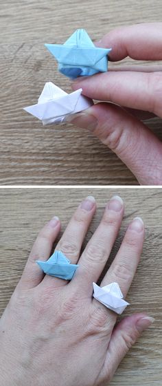 two pictures of someones hand holding origami birds on their fingers, one is blue and the other is white