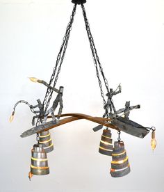 a chandelier made out of metal and wood