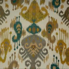 a close up view of an ornate design on fabric