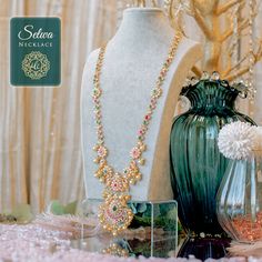 Add exquisite craftsmanship and an artisanal touch to your attire by wearing our Selwa Necklace! Beautiful rubies, emeralds and CZ stones come together to decorate this unconventional mala necklace. Approximate mala length is 16". Gold-plated on high-quality brass as base metal. In-stock & ready-to-ship. *Please Note: We use faux stones and beads in all of our jewelry. Spiritual Gemstone Necklaces For Celebration, Temple Jewelry Style Jeweled Necklace As Gift, Fusion Style Necklace With 17 Jewels For Festivals, Jeweled Temple Jewelry Necklace As Gift, Temple Jewelry Style Necklace As A Gift, Spiritual Kundan Necklace With Gemstones For Celebration, Temple Jewelry Necklaces With Stones For Jewelry Making, Temple Jewelry Necklaces With Gemstone Beads For Celebrations, Festive Temple Jewelry Necklaces With Stones