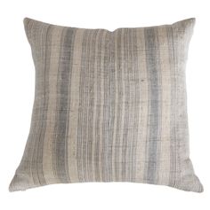 a gray and white striped pillow on a white background