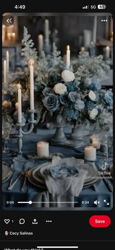 an image of a table setting with candles and flowers in the center, on instagram