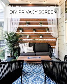 an outdoor living room with black furniture and white curtains on the window sill that says diy privacy screen