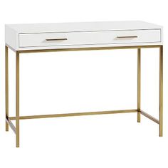 a white and gold desk with two drawers